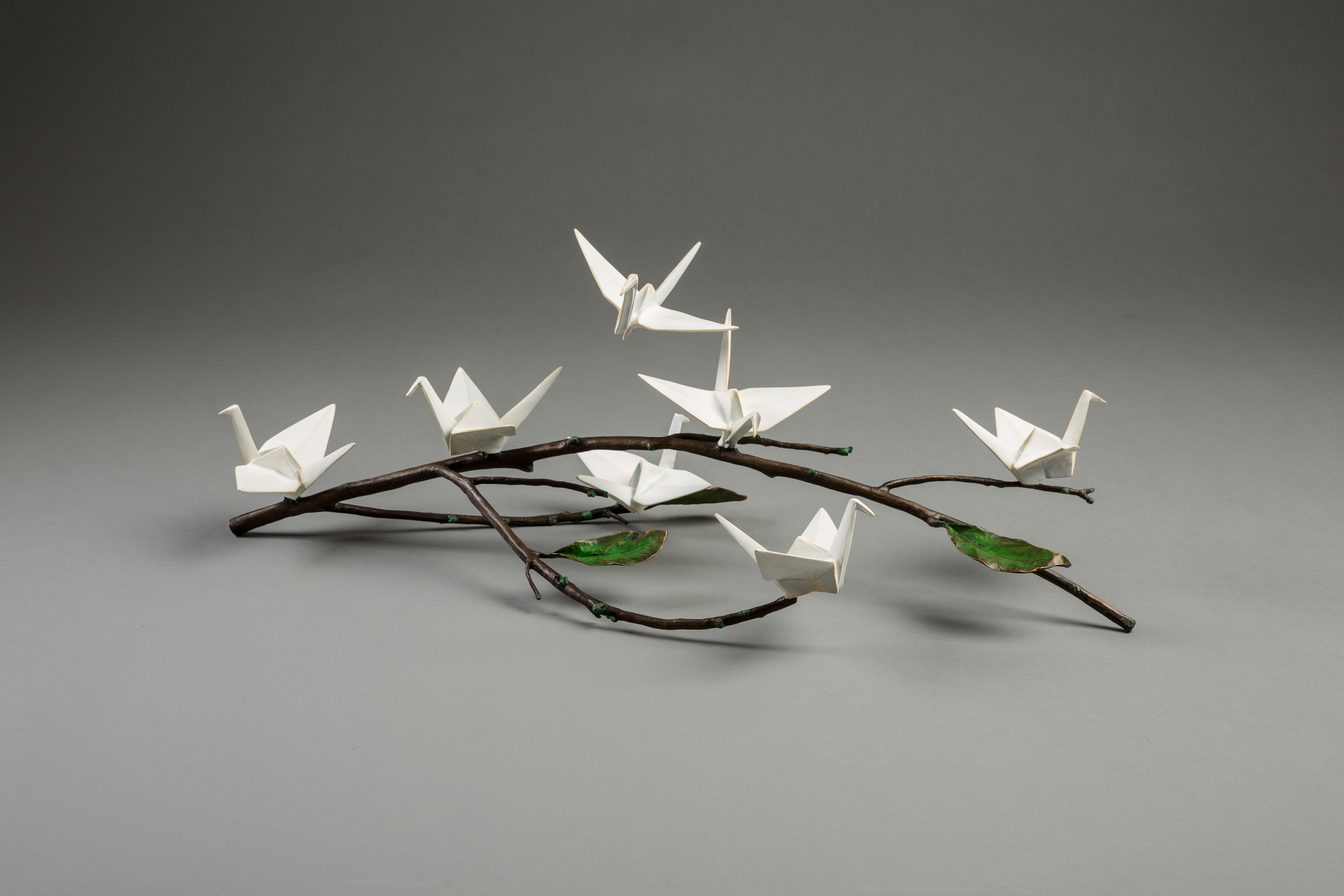 origami cranes on branch sculpture