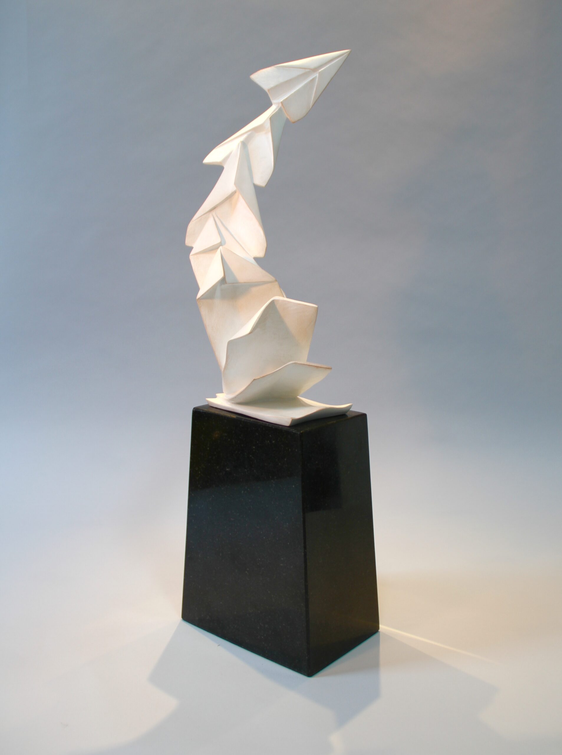 Paper airplane with folds sculpture